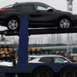 De que cor é o carro que causa seu valor novamente?