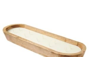 A vela de madeira existente ao culto de Aldi voltou à loja e é o sotaque perfeito de alto estilo