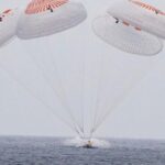 O astronauta da NASA esboço no costa da costa do júnior pela primeira vez em 50 anos
