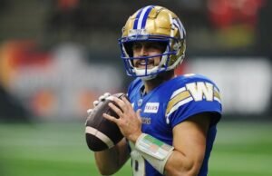 Zach Collaros para bombas azuis voltadas para os gatos favoritos de Tiger-Cats