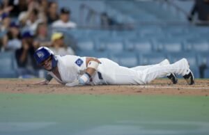 O Dodger exclui as rochas para crescer oeste da NL, mas Smith está atrasado