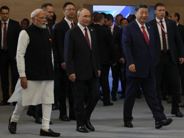 China-Welcomes-Putins-Visit-to-India-as-Step-Towards-Global.jpg