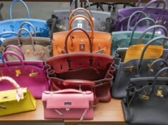 Coberto de bolsas caras, relógios e dinheiro no valor de 6 milhões de dólares