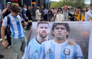 Franco Colapinto chegou ao Grande Prêmio da Bélgica com a bandeira de Messi e Maradona antes da final da Copa do Mundo de 2026.